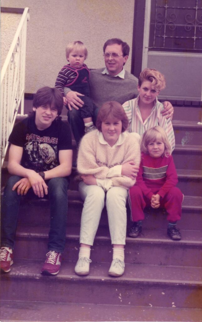 Paul Rogan 1984 with children