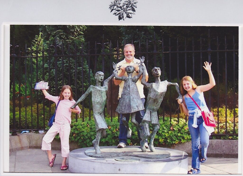 Breanna, Ciara and Dennis with the “Children of the New Millennium” on Nicholas St. across from Christ Church Cathedral, summer 2004