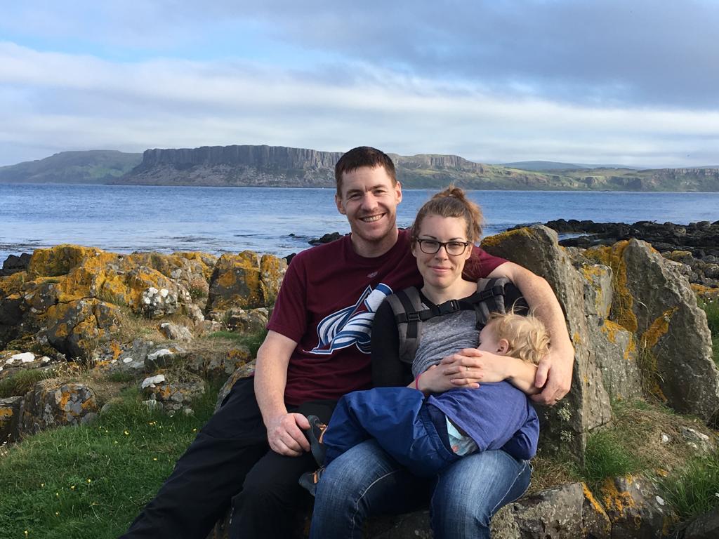 Chris, Catherine & Owen. Photo of Chris, Catherine and Owen, with the North Antrim Coast in the background