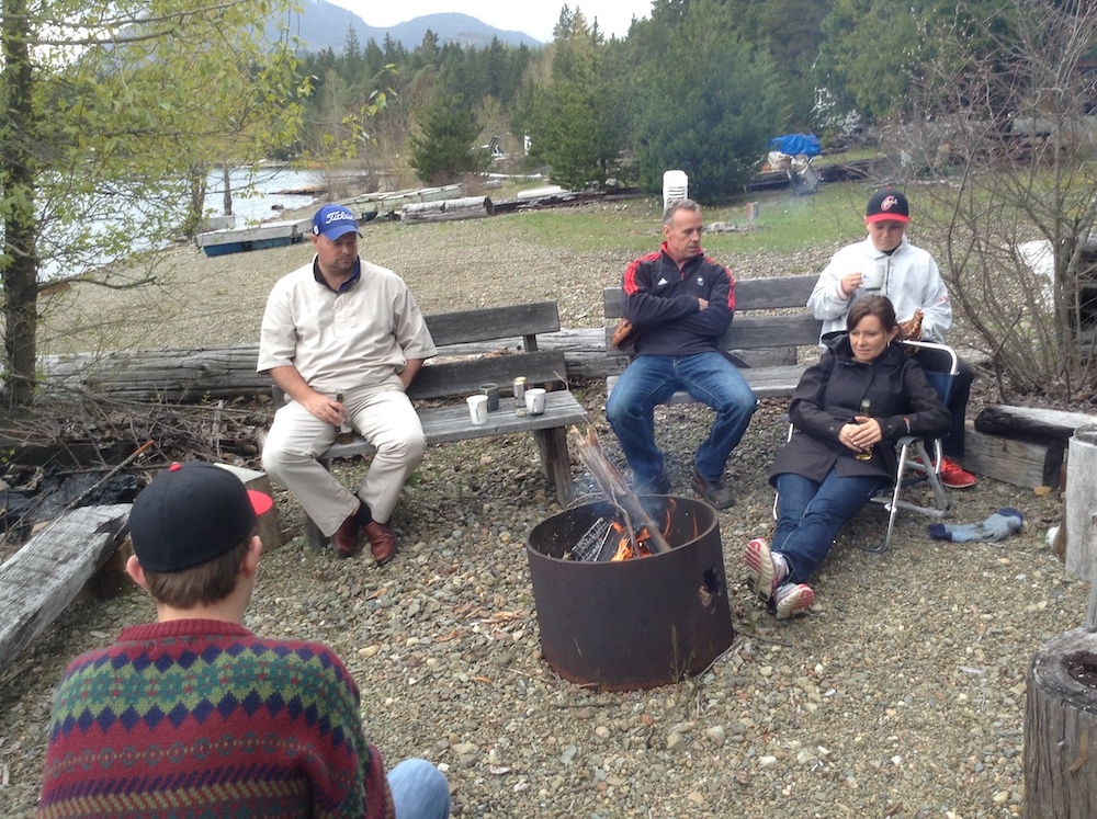 Beautiful April day 2018 sitting around bone fire at horne Lake after dinner. Nick with his back to camera, sone Ed, don-in-Law Fred Young, Nate and our daughter Sheena Young